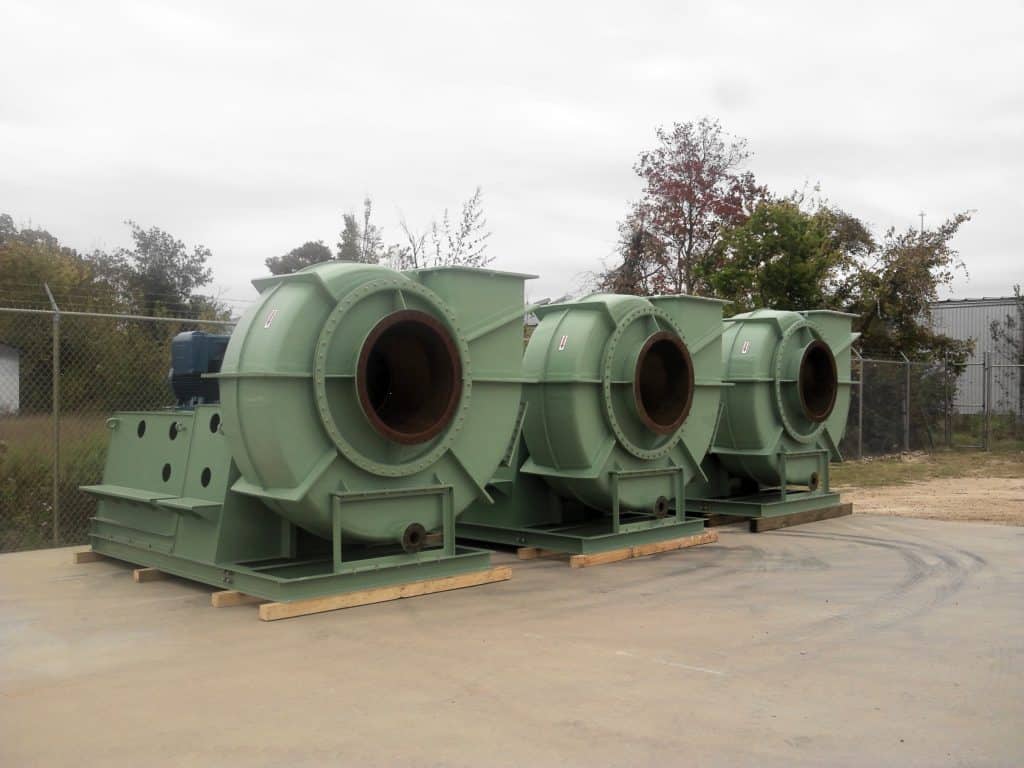 three green industrial blowers